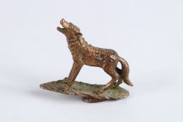 A JAPANESE OKIMONO BRONZE WOLF.