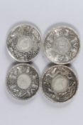 FOUR VARIOUS SILVER METAL COIN DISHES with dragons, snakes, monkeys and other motifs. 3.75ins