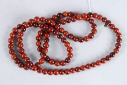 A BUFFALO HORN BEAD CHAIN.
