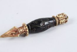 A TIBETAN RITUAL DAGGER with mounted agates.