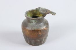 A JAPANESE OKIMONO BRONZE WATER TANK AND BIRD.