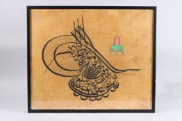 AN OTTOMAN WRITING, framed and glazed. 27ins x 22ins.