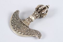 A TIBETAN WHITE METAL RITUAL CHOPPER.