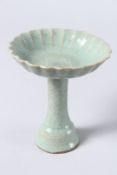 A CHINESE CELADON HIGH STEM CIRCULAR CENSER. 5.5ins high.