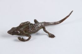 A JAPANESE OKIMONO BRONZE LIZARD.