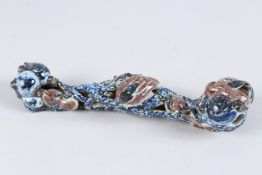 A CHINESE BLUE SPECKLED PORCELAIN SCEPTRE. 11ins high.