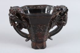 A CHINESE BUFFALO HORN LIBATION CUP.