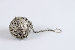 A CHINESE OPEN WORK WHITE METAL CENSER BALL.