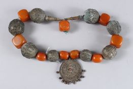 A LARGE ISLAMIC NECKLACE with medallion.