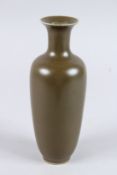 A SMALL CHINESE PLAIN BROWN VASE. Six character mark.