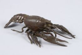 A JAPANESE OKIMONO BRONZE LOBSTER with articulated leg.