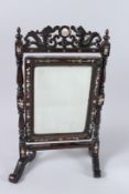A GOOD CHINESE MOTHER-OF-PEARL INLAID MIRROR. 18ins high.