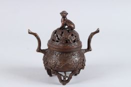 A GOOD CHINESE BRONZE CIRCULAR KORO AND COVER with monkey finial. 6.5ins high.