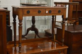 A Victorian mahogany two-tier side table.