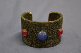 A cuff style bracelet.