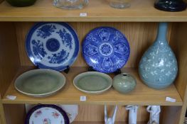Japanese and Chinese porcelain to include celadon ceramics, blue and white plates etc.