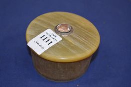 A circular horn box and cover.