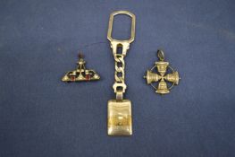 Silver pendant and other items.