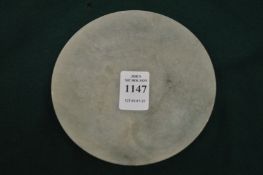 A Chinese plain circular shallow dish.