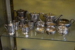 Various plated jugs, teapots, sugar bowls etc.