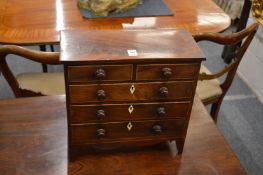 A good 19th century mahogany miniature chest of drawers.