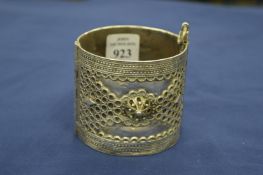 An Eastern white metal bangle.