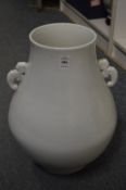 A large Chinese blanc de chine twin handled vase.
