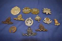 Various military badges.