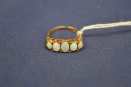 A 9ct gold and opal five stone ring.