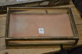 A small gilt wood display case.