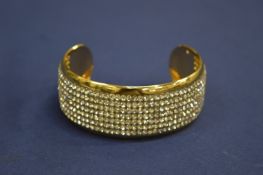 A diamante cuff style bracelet.
