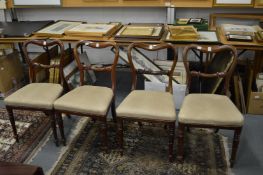A set of four William IV mahogany dining chairs.