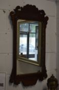 A Georgian style fretwork framed mirror.