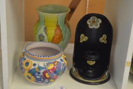 A Poole pottery bowl and two other items.