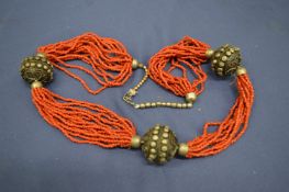 Coral style necklace.