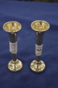 A small pair of silver bud vases.