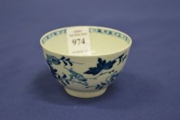 A small Chinese blue and white tea bowl.