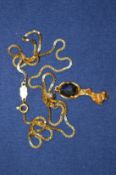 An 18ct gold pendant and chain.