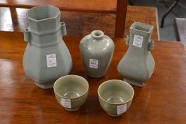 Five pieces of Chinese celadon glazed pottery to include vases and bowls.