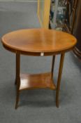An inlaid mahogany oval occasional table.