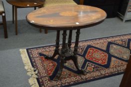 A Victorian inlaid walnut oval occasional table.