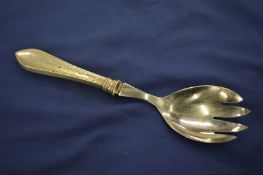 A Danish silver handled spork.