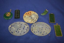 Jadeite tablets and other items.