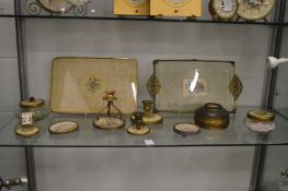 A collection of decorative dressing table items.