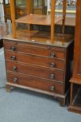 A 19th century straight front chest of four long drawers with a brushing slide.