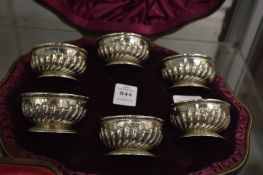 A cased set of six circular silver salts, Sheffield 1860.