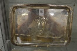 A silver dressing table tray.