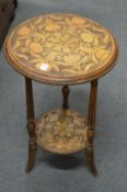 A poker work two-tier occasional table.