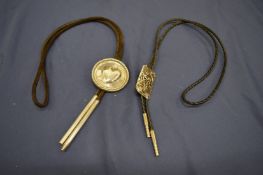 A decorative pendant signed Goldstein.