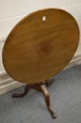A 19th century mahogany tilt-top tripod table.